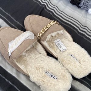 Tan mules with furry lining